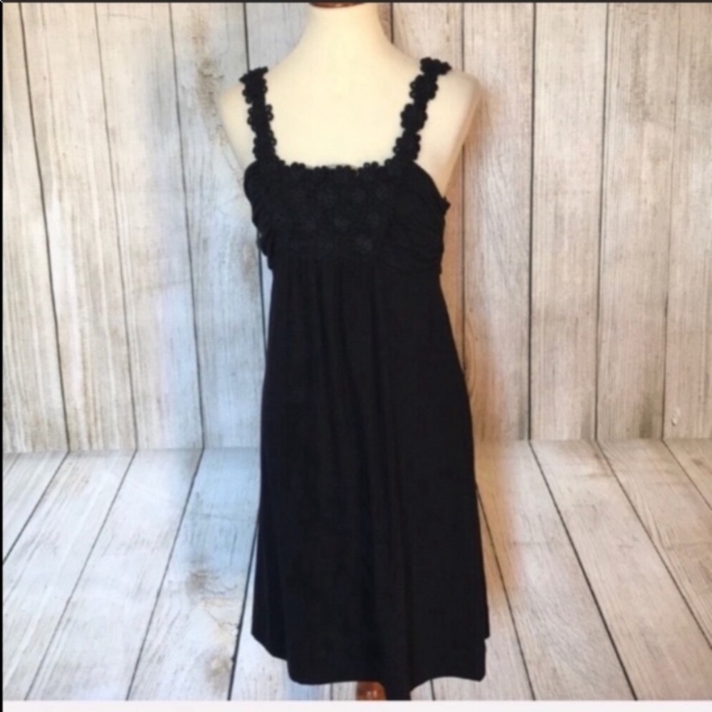 Black sundress with flower detail at top